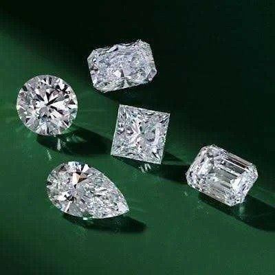 Assorted diamond shapes: round, pear, princess, emerald, radiant